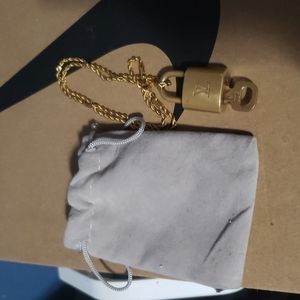Louis Vuitton Lock on a chain